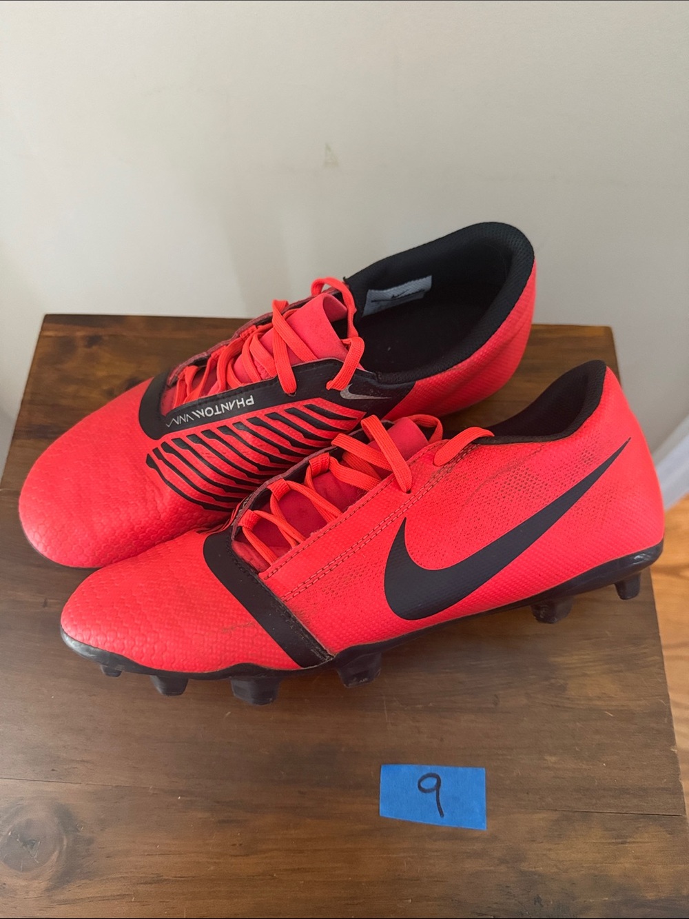 Nike Men’s Soccer Cleats in Bright Red with Black Swoosh